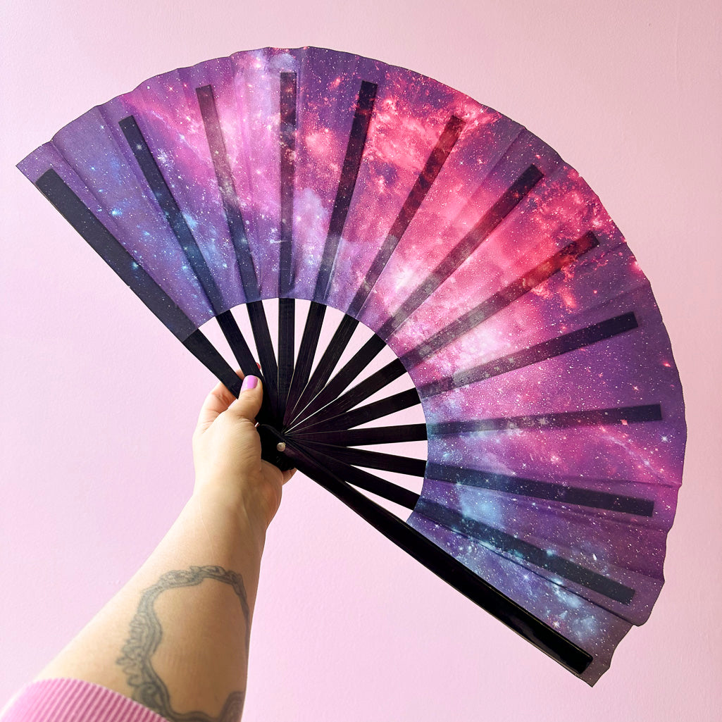 Giant Clacking Hand Fan with Pink & Purple Nebula print (Glows in UV!)