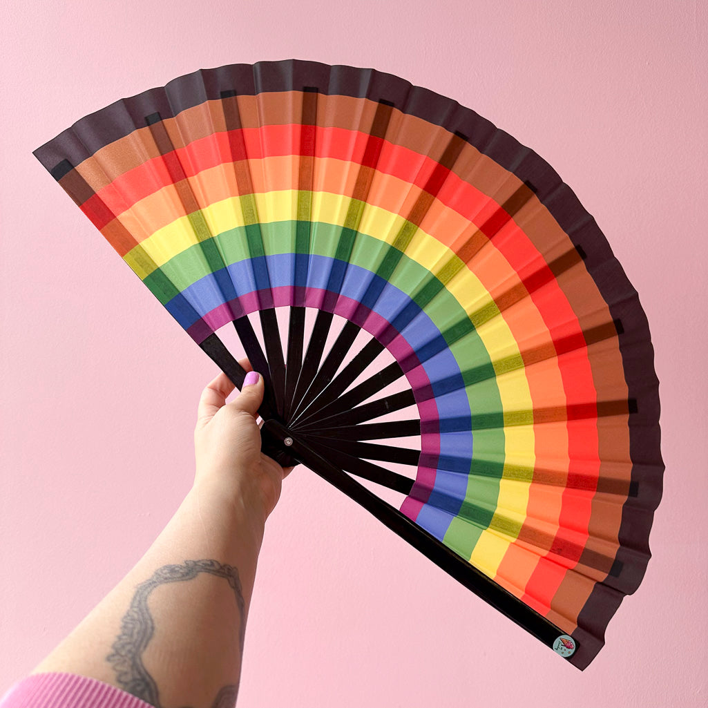 Giant Clacking Hand Fan with Queer Rainbow print (Glows in UV!)
